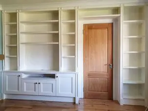 Full wall spraypainted book case in ivory Full wall spraypainted book case in ivory